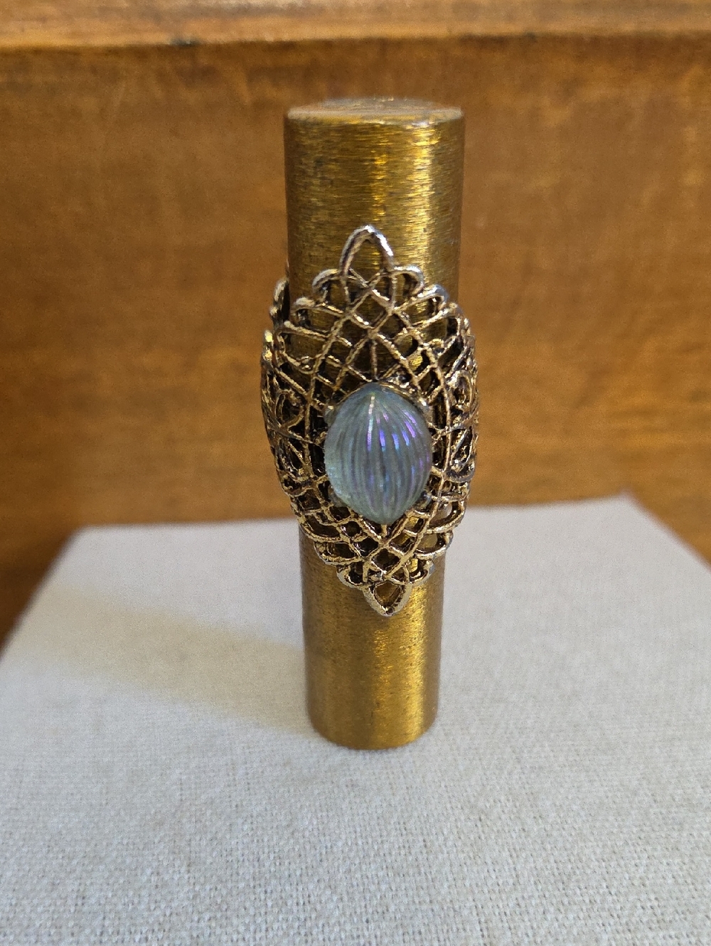 Vintage Revlon Gold Filigree Lipstick Case with Iridescent Blue Cabachons